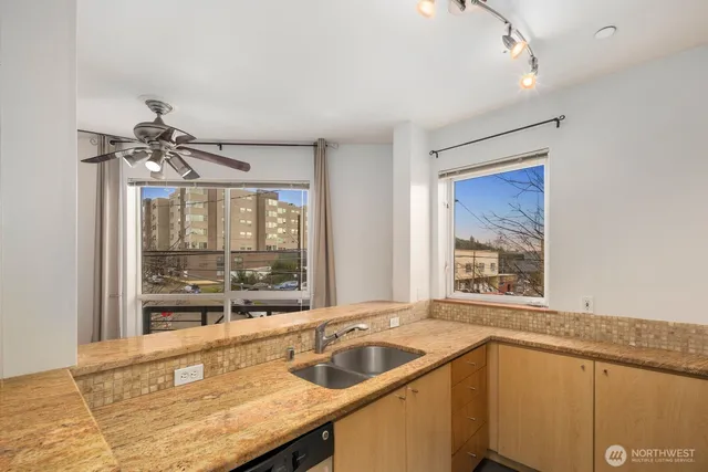 a kitchen with a stove and a microwave