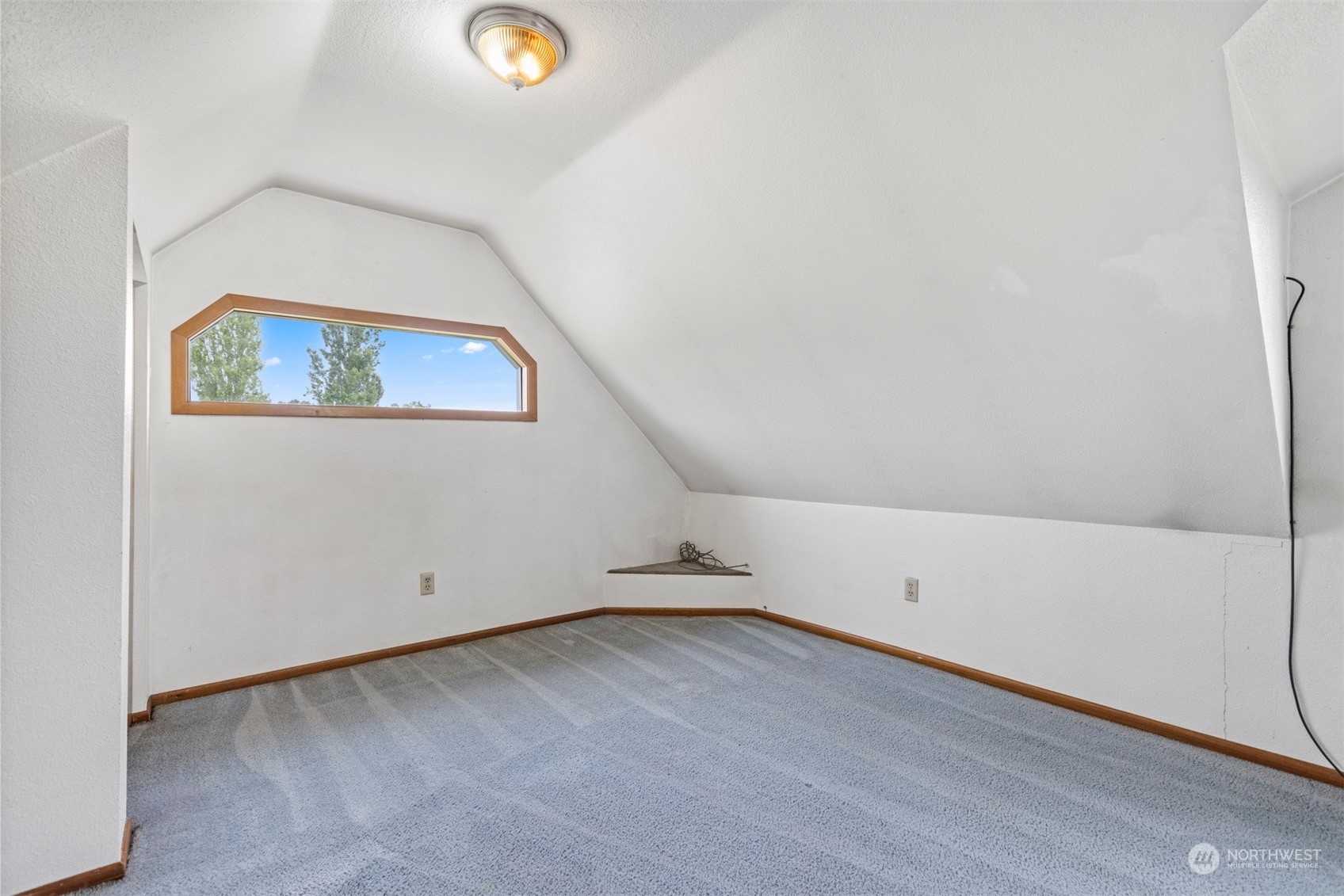 1321 East Axton Road Bellingham, WA 98226 - Photo 30 of 40 an empty room with wooden floor and windows