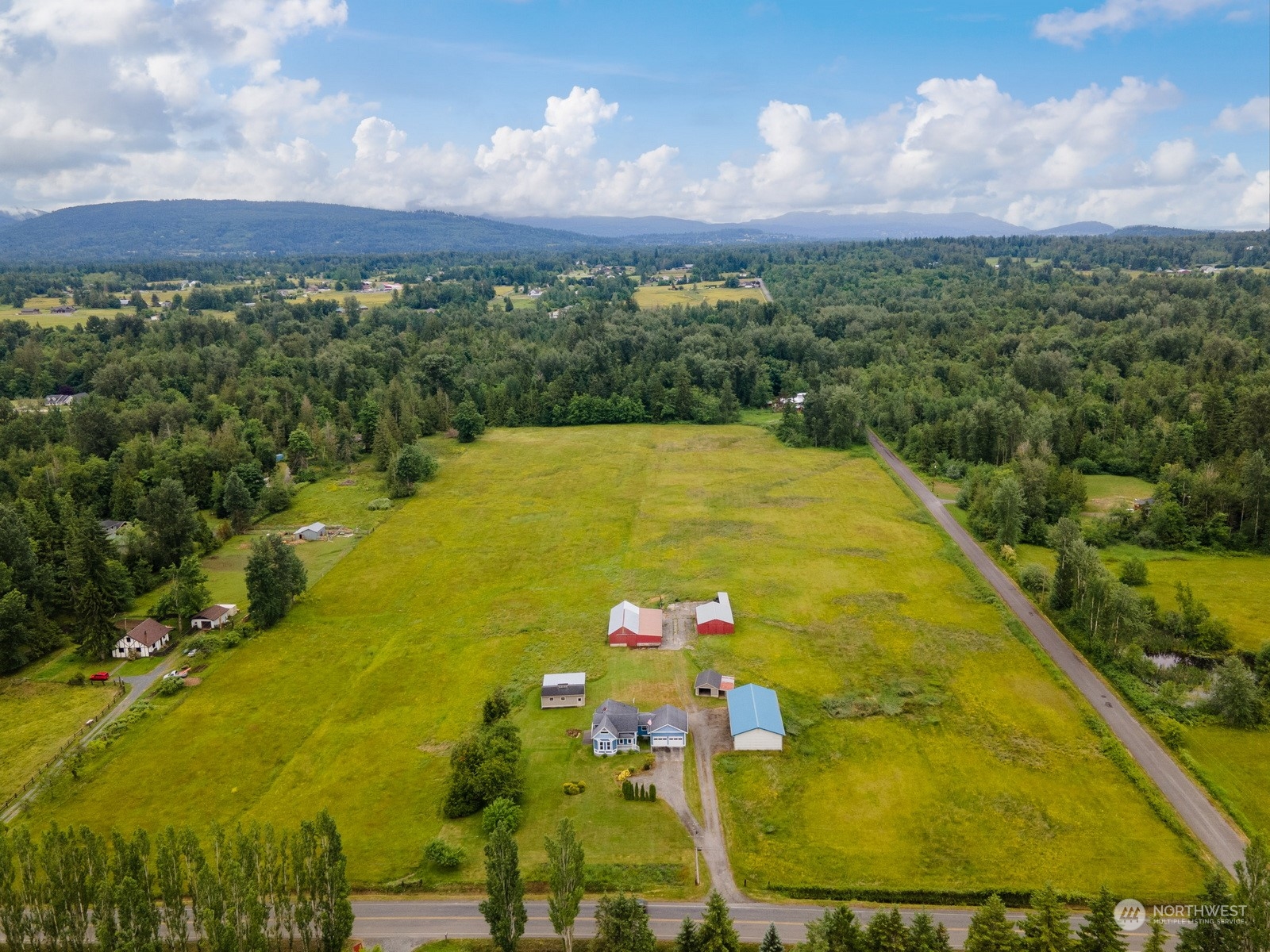 1321 East Axton Road Bellingham, WA 98226 - Photo 36 of 40 a view of a swimming pool with a yard