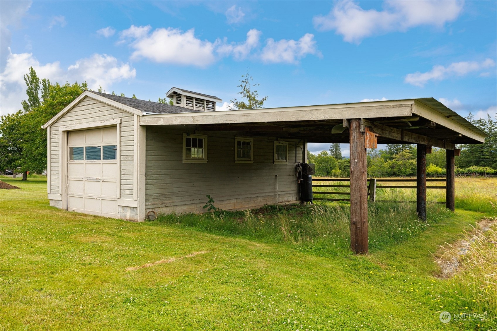 1321 East Axton Road Bellingham, WA 98226 - Photo 8 of 40 a view of a house with a yard