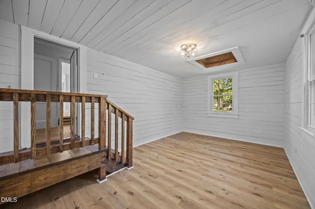 a view of entryway with wooden floor
