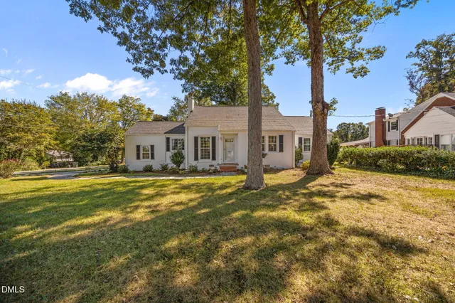 a front view of a house with swimming pool