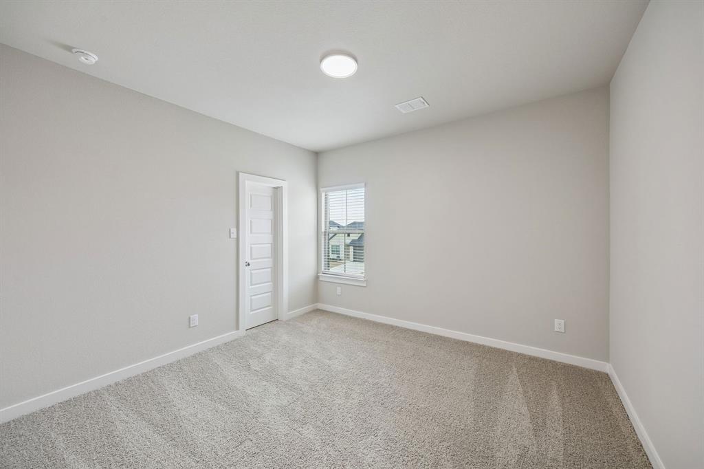 2109 Sunshining Road Princeton, TX 75407 - Photo 24 of 35 Bedroom in the Stanley II home plan by Trophy Signature Homes – REPRESENTATIVE PHOTO