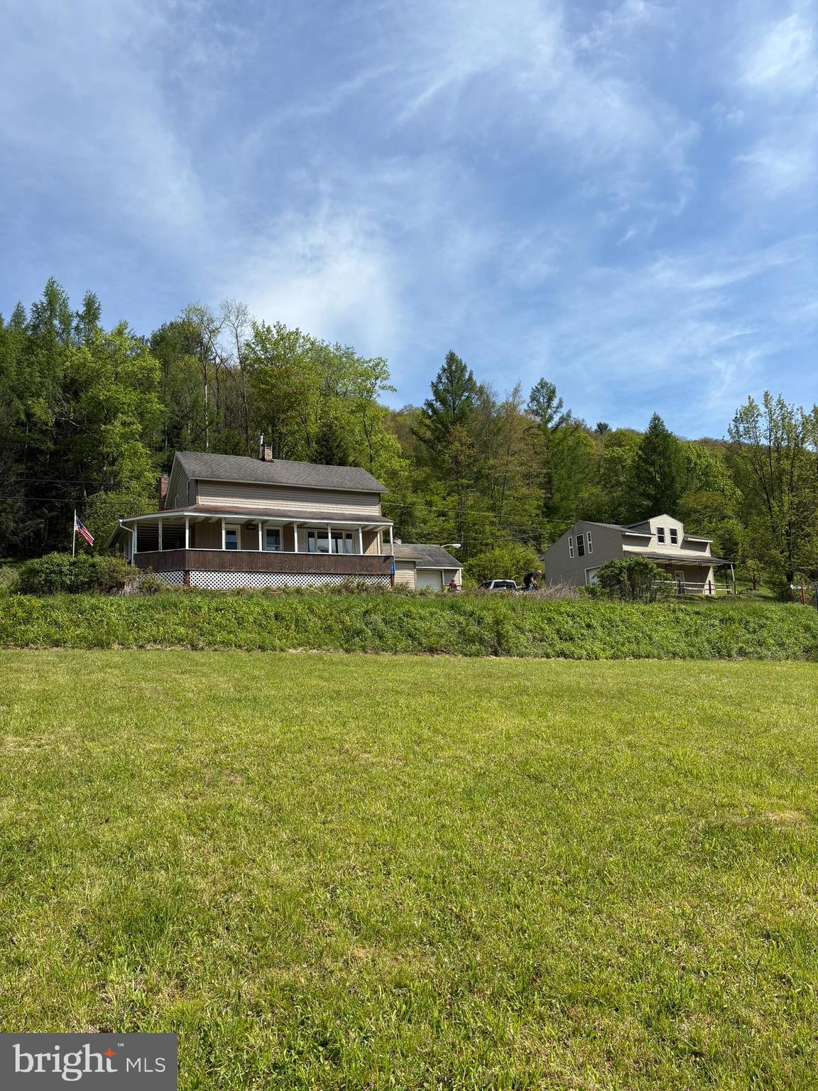 1315 1st Fork Road Austin, PA 16720 - Photo 3 of 25 a front view of house with yard and trees