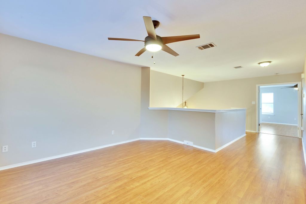 3201 Mocha Trail Austin, TX 78728 - Photo 16 of 26 a view of empty room with wooden floor