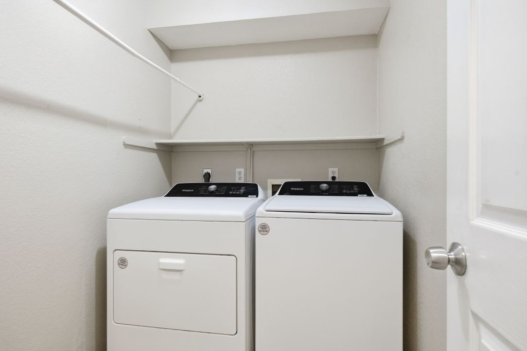 3201 Mocha Trail Austin, TX 78728 - Photo 25 of 26 a utility room with dryer and washer