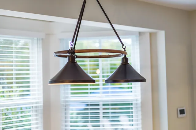 a view of room with window and wooden floor