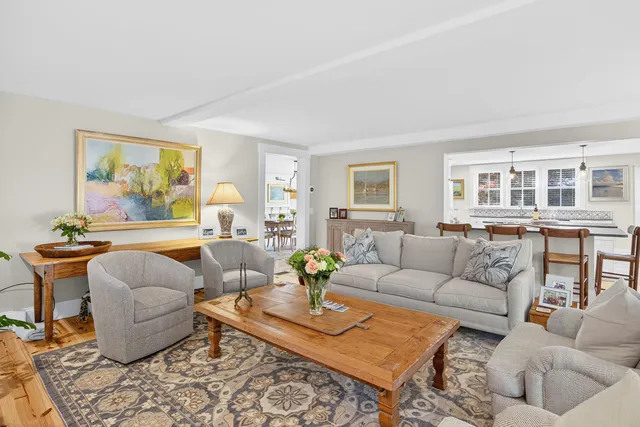 a bedroom with bed and a book shelf