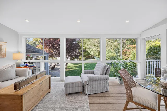 a bathroom with a double vanity sink mirror and shower