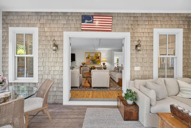 a view of a hallway with paintings on the walls