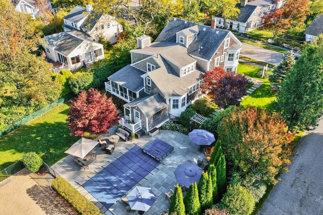 a view of a patio with furniture and a table