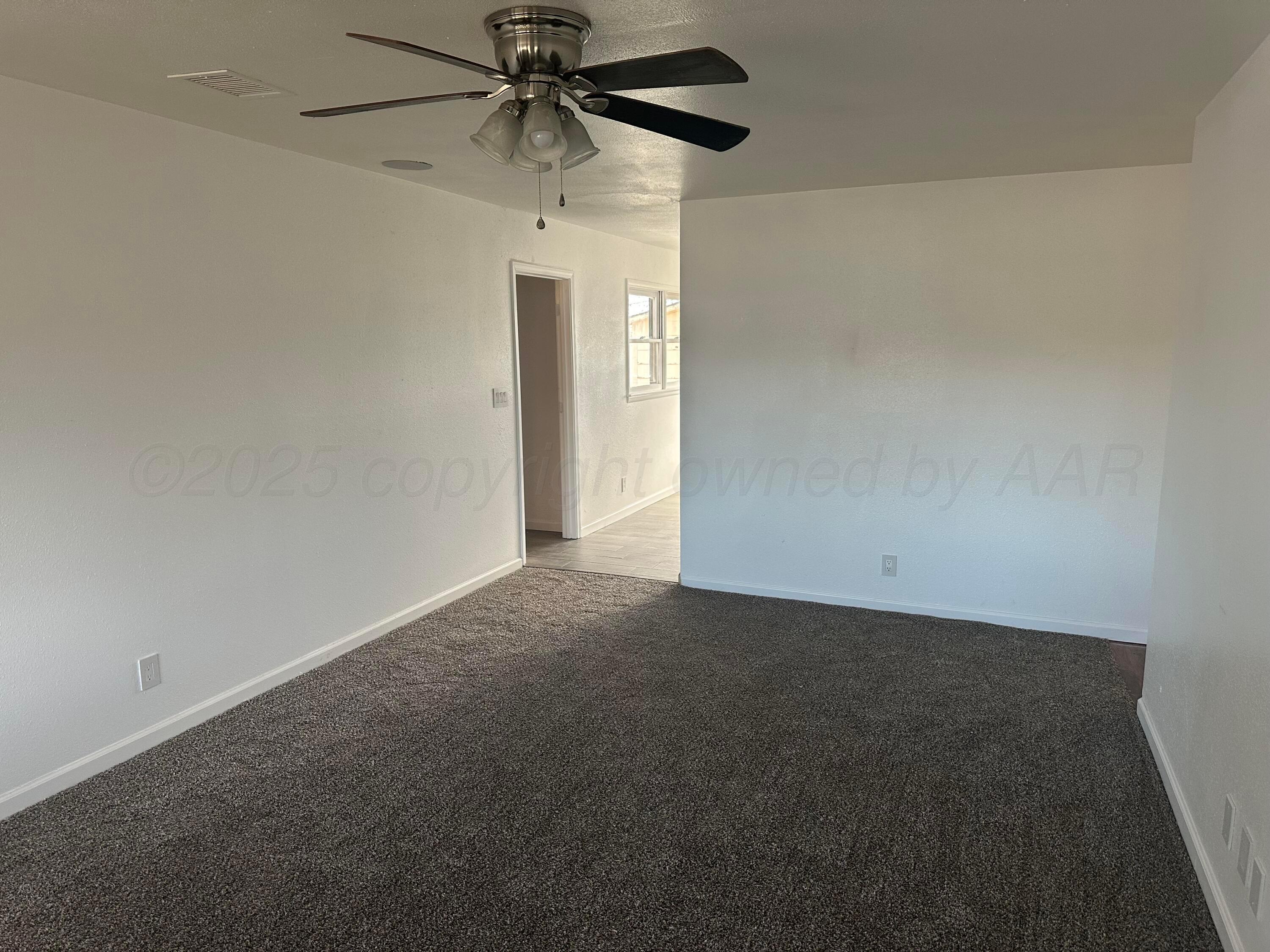 4854 Morning Drive Amarillo, TX 79108 - Photo 19 of 22 a view of a small space with a fan