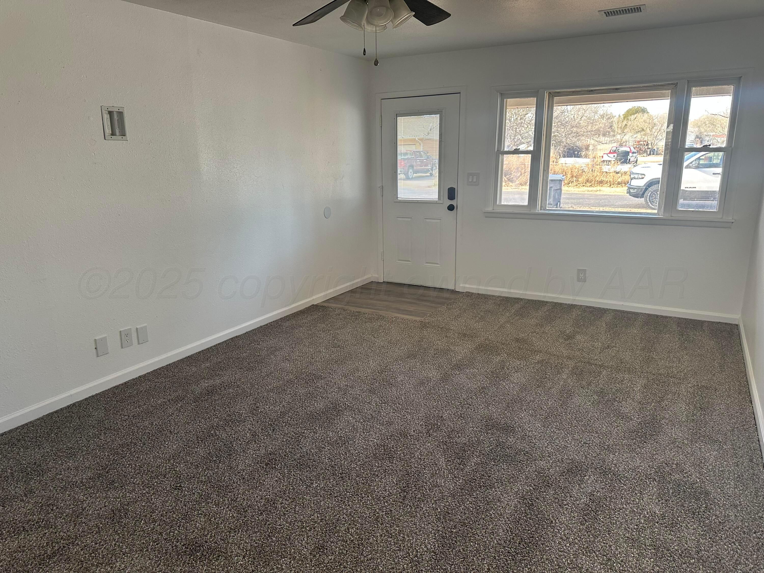 4854 Morning Drive Amarillo, TX 79108 - Photo 22 of 22 an empty room with a window