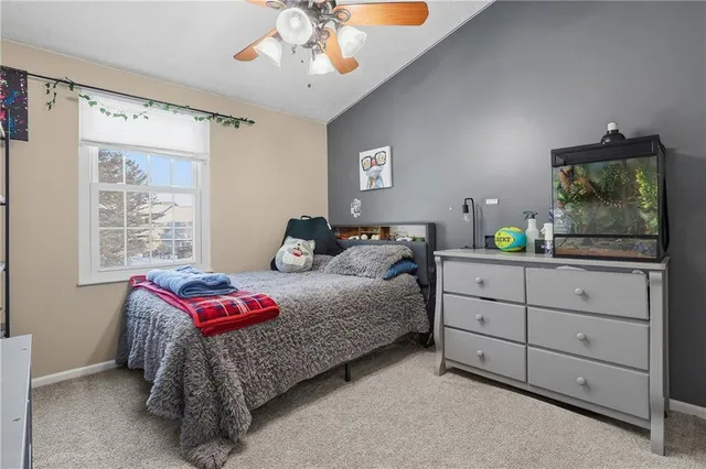 a bedroom with a bed and a closet