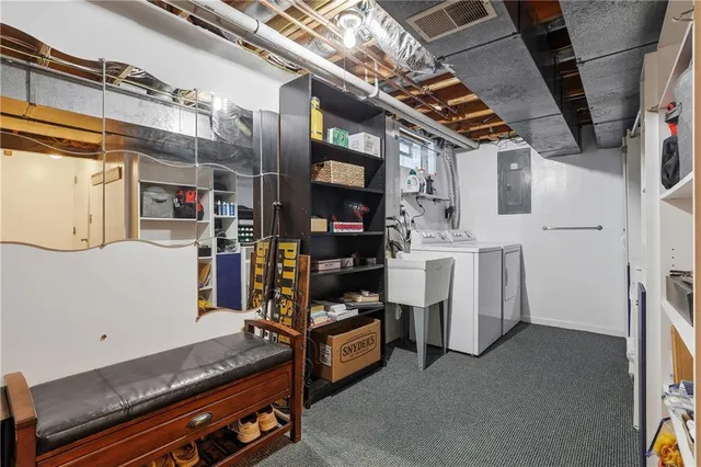 a storage room with washer and dryer