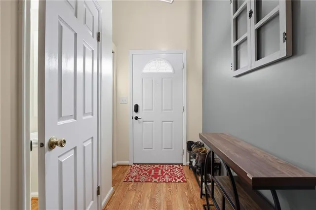 a view of bedroom with furniture and wooden floor