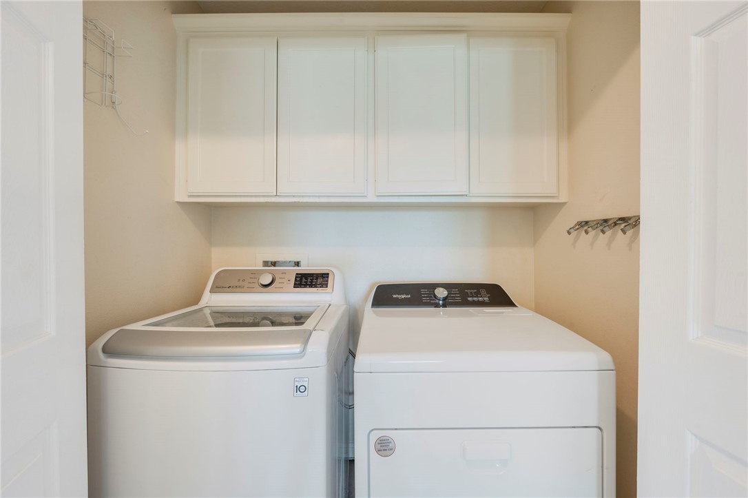 501 Riggs Street Brenham, TX 77833 - Photo 18 of 22 a utility room with dryer and washer