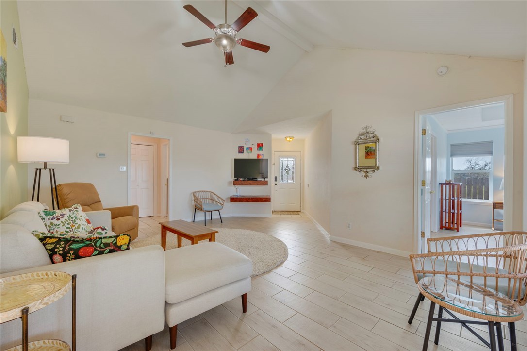 501 Riggs Street Brenham, TX 77833 - Photo 6 of 22 a living room with furniture and a wooden floor