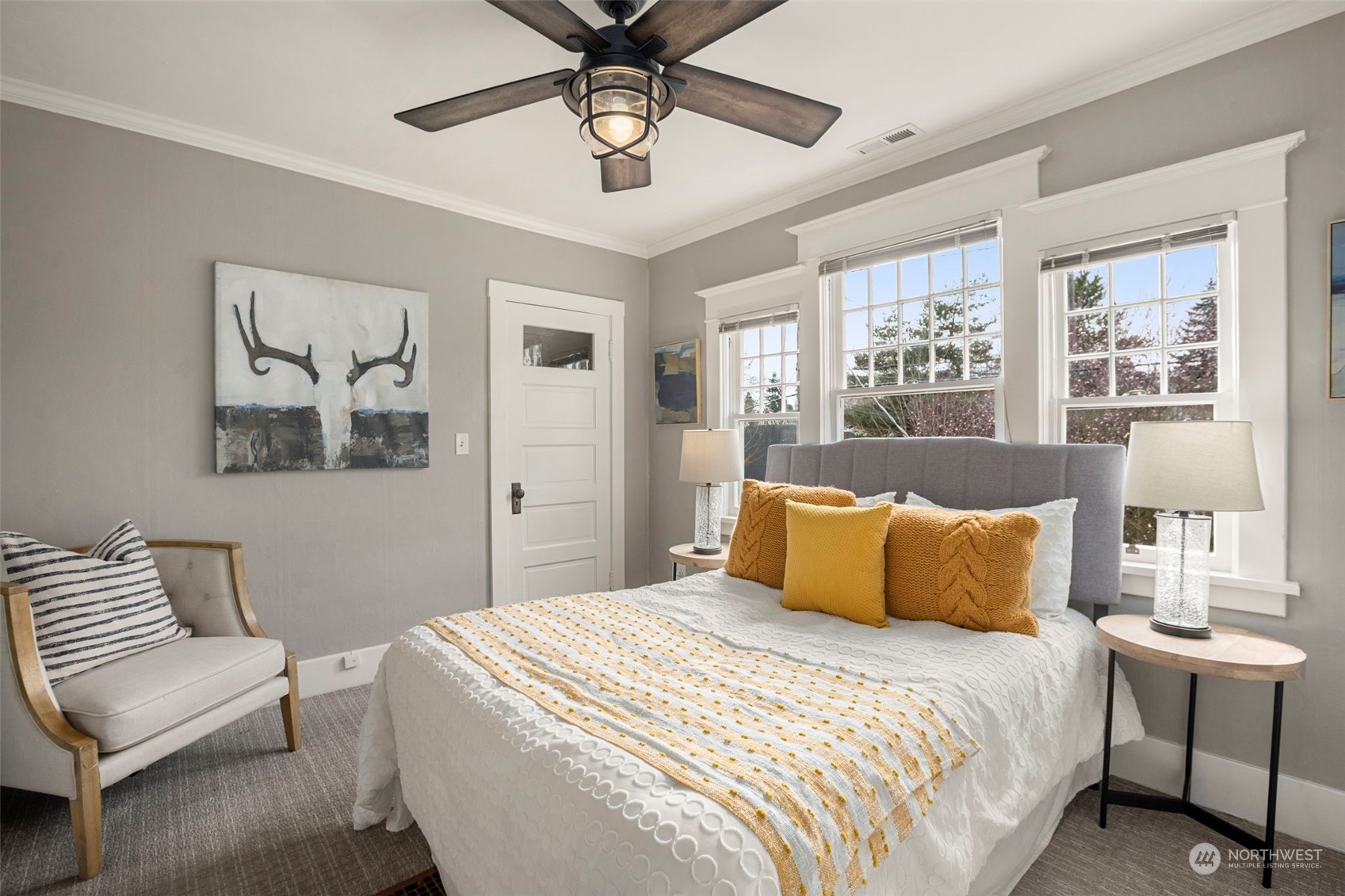 4510 2nd Avenue Northeast Seattle, WA 98105 - Photo 15 of 23 a bedroom with a large bed and a window