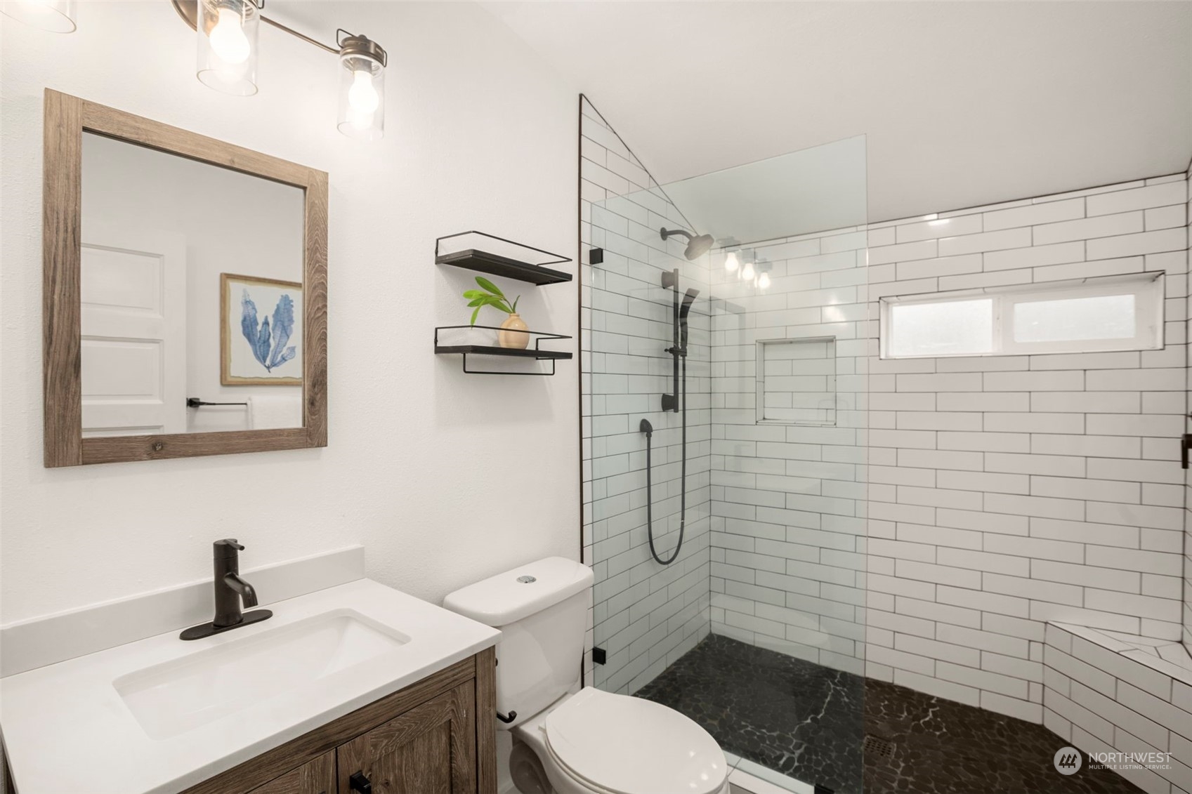 4510 2nd Avenue Northeast Seattle, WA 98105 - Photo 17 of 23 a bathroom with a toilet sink and shower