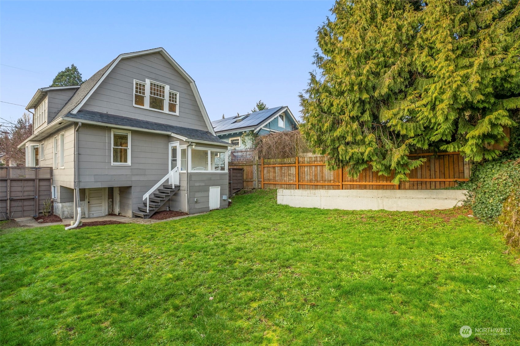 4510 2nd Avenue Northeast Seattle, WA 98105 - Photo 23 of 23 a front view of a house with a yard