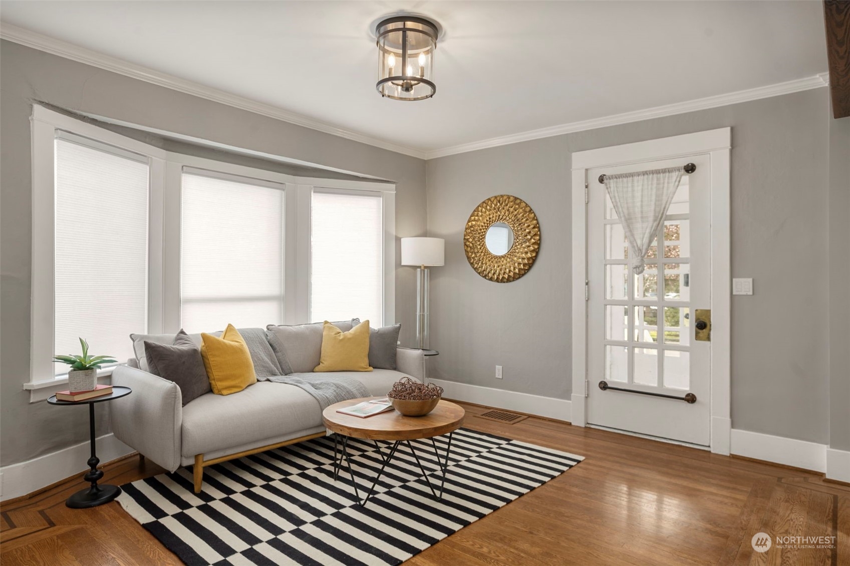 4510 2nd Avenue Northeast Seattle, WA 98105 - Photo 5 of 23 a living room with a couch and a window