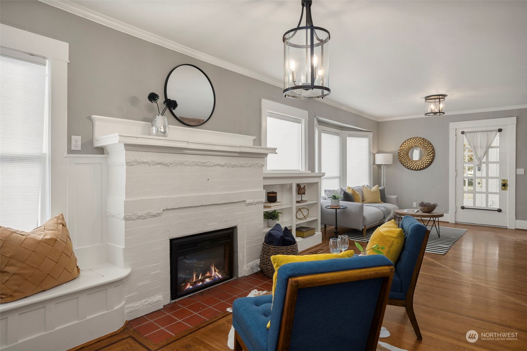 4510 2nd Avenue Northeast Seattle, WA 98105 - Photo 8 of 23 a living room with furniture a window and a fireplace