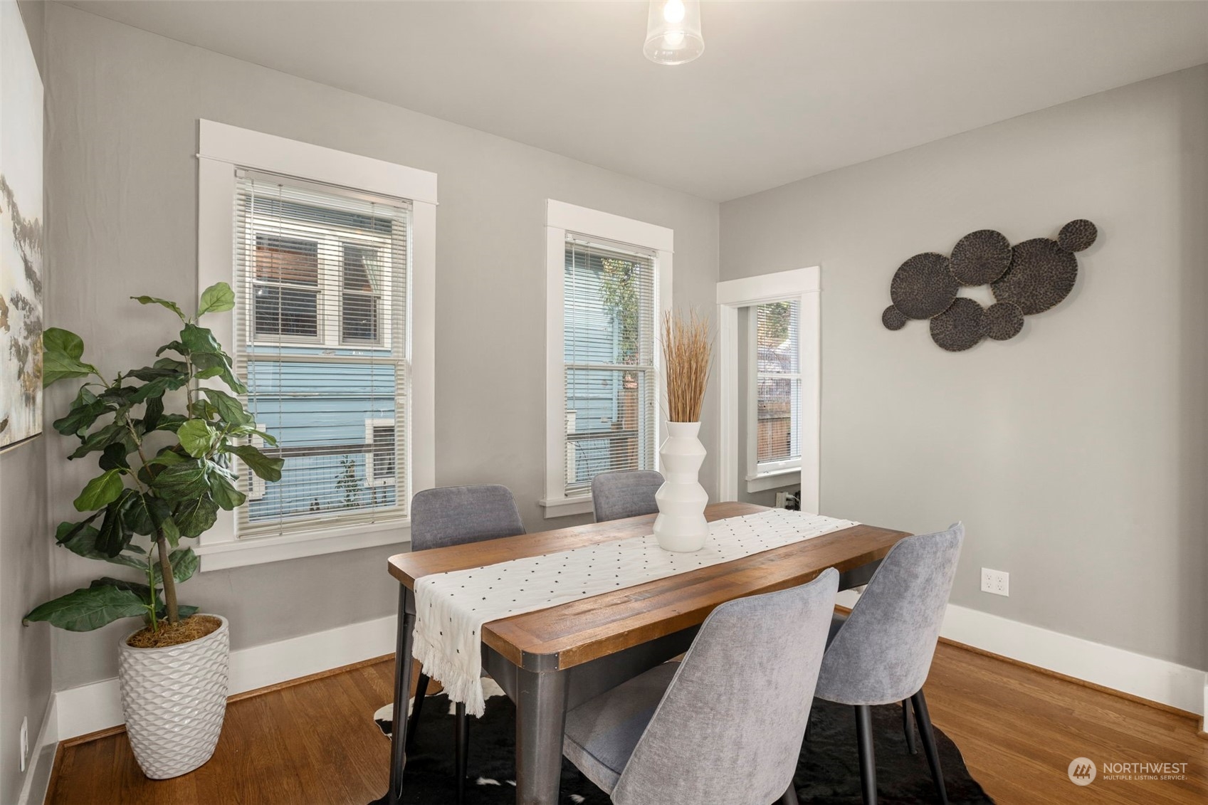 4510 2nd Avenue Northeast Seattle, WA 98105 - Photo 9 of 23 a dining room with furniture and wooden floor
