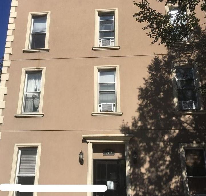 129 19th Street Brooklyn, NY 11232 - Photo 1 of 8 a front view of a building with a tree
