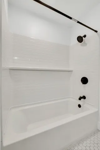 a bathroom with a bathtub