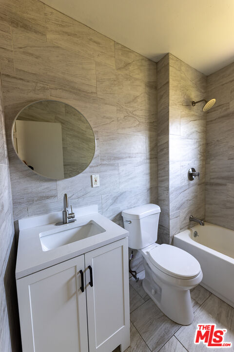 4119 Marlton Avenue, Unit 1 Los Angeles, CA 90008 - Photo 12 of 13 a bathroom with a sink toilet and shower