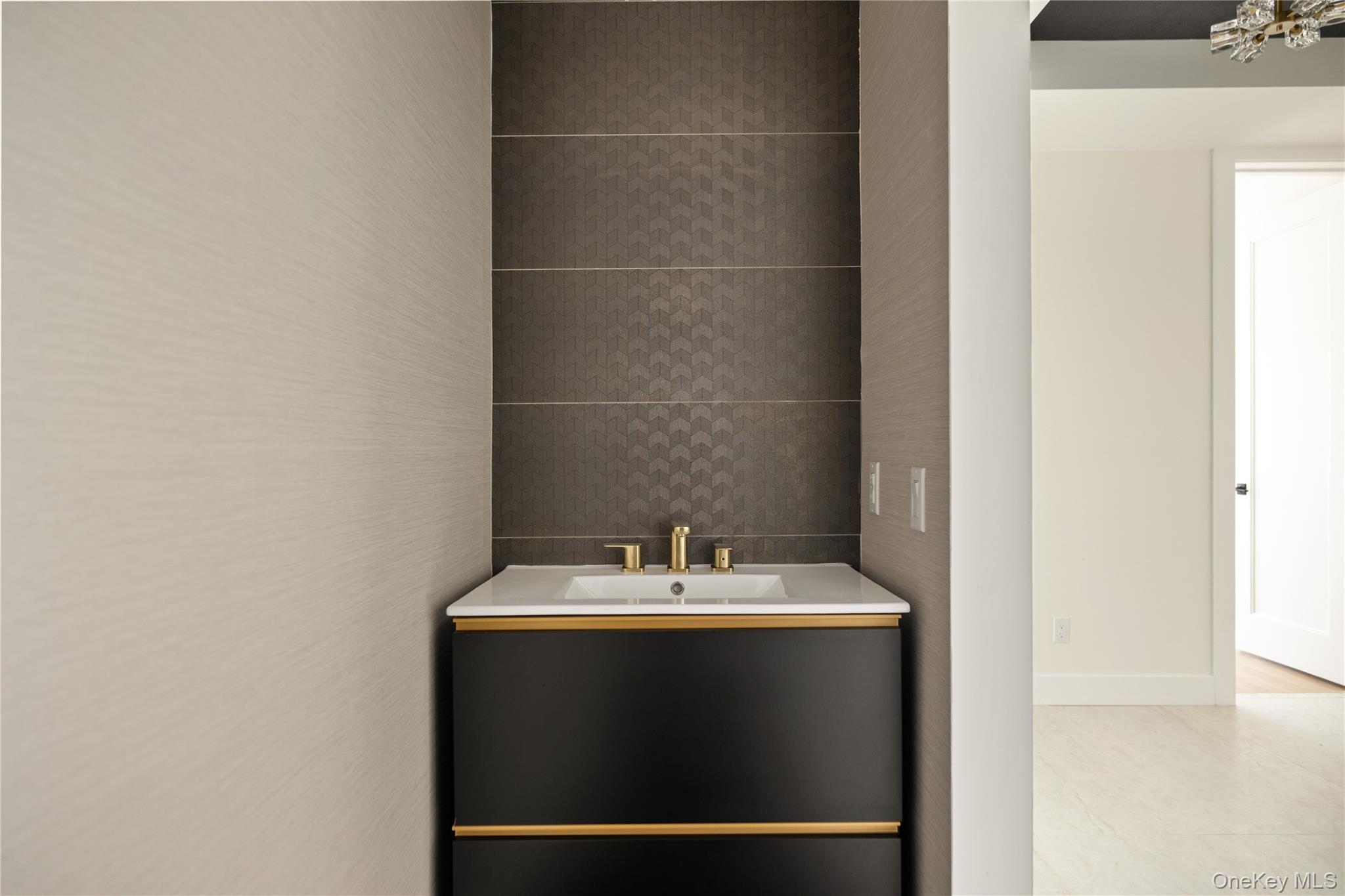 3 Valley Way, Unit 320 Spring Valley, NY 10977 - Photo 21 of 41 Bathroom with vanity and tile walls