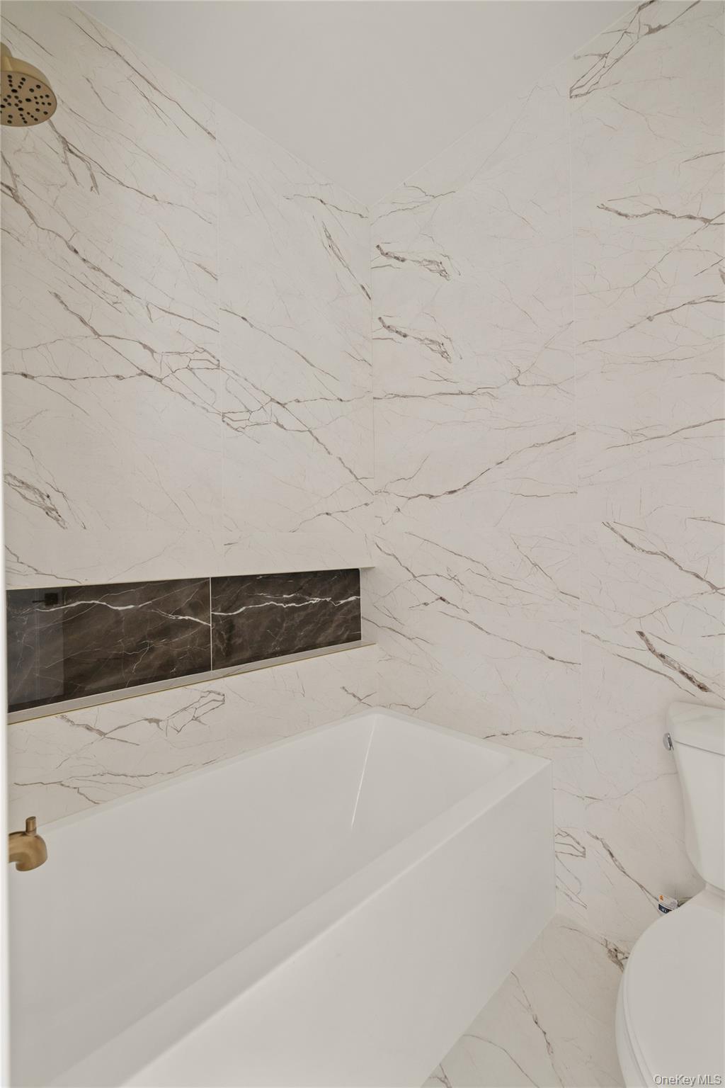 3 Valley Way, Unit 320 Spring Valley, NY 10977 - Photo 30 of 41 Full bath with toilet and marble tiled floors