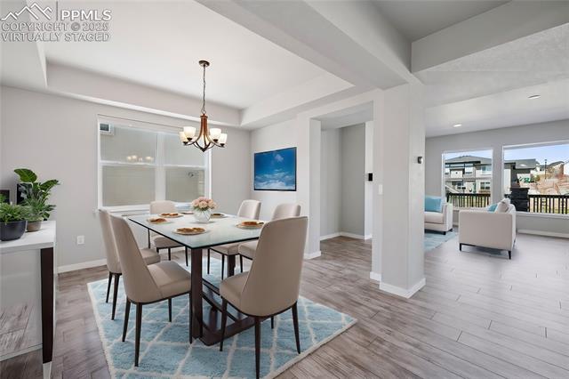 1960 Ruffino Drive Colorado Springs, CO 80921 - Photo 9 of 44 Virtually staged dining room