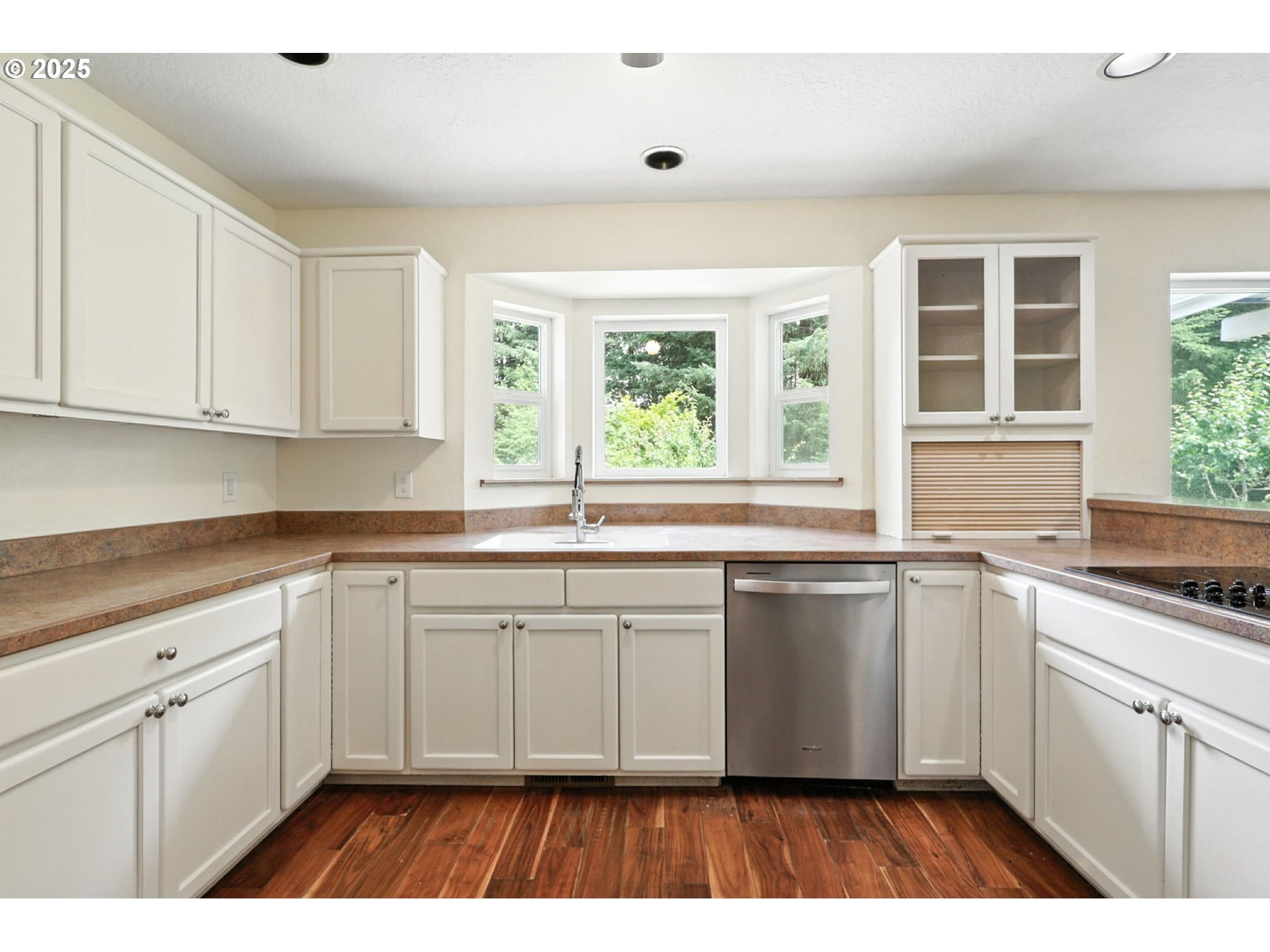 116 Noble Road Winlock, WA 98596 - Photo 11 of 48 a kitchen with a sink window and cabinets