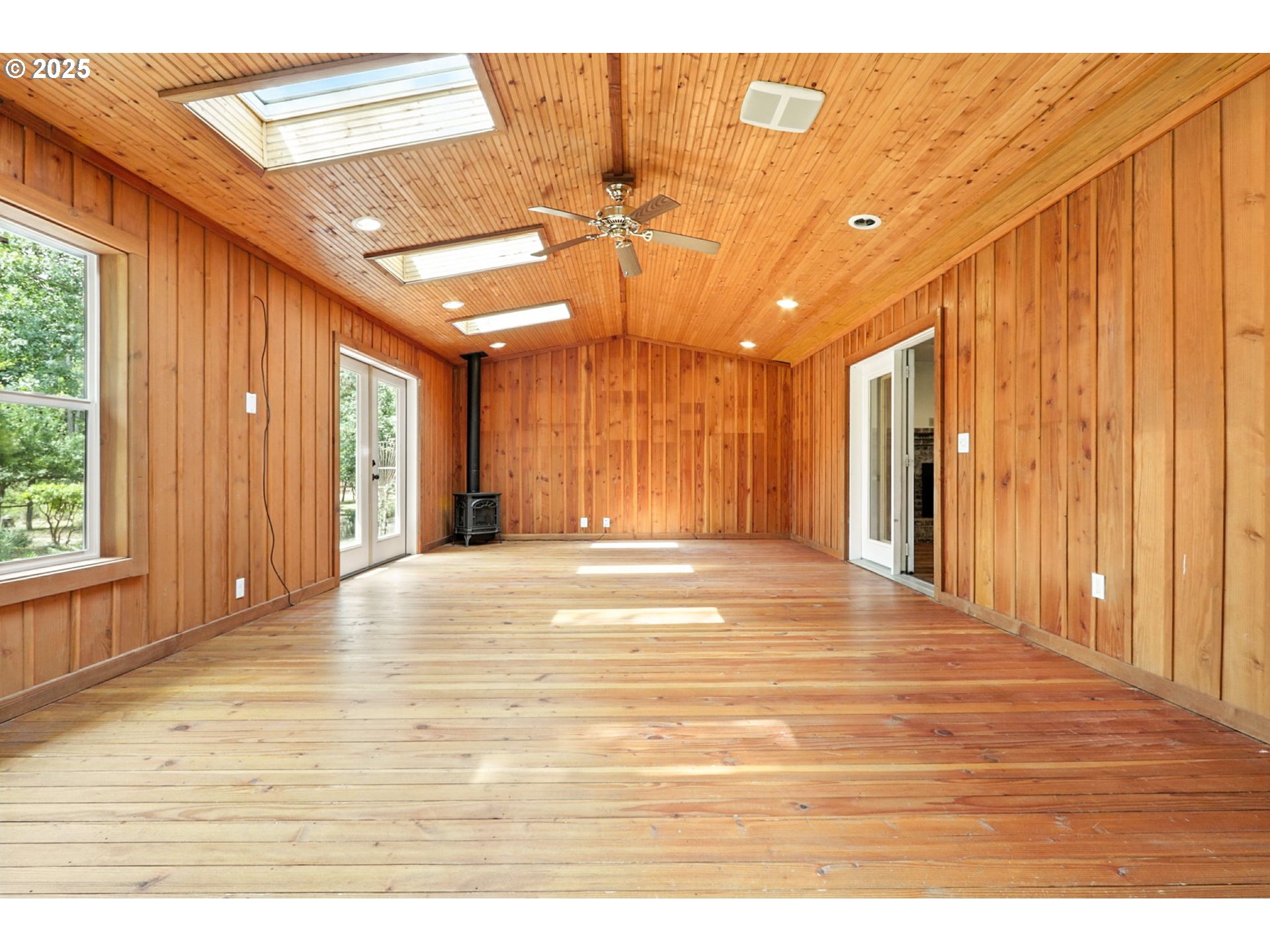 116 Noble Road Winlock, WA 98596 - Photo 19 of 48 a view of a room with wooden floor and windows