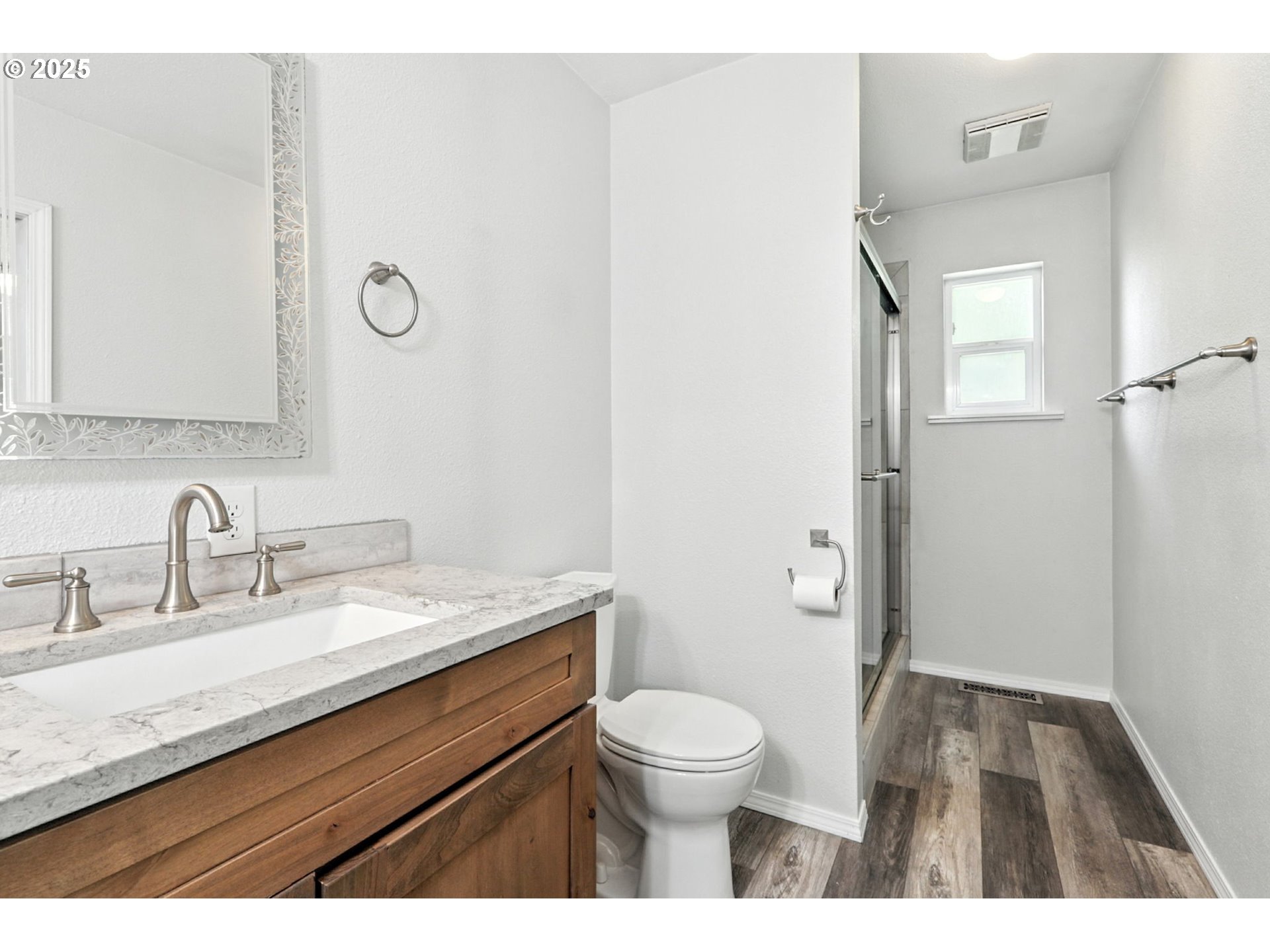 116 Noble Road Winlock, WA 98596 - Photo 24 of 48 a bathroom with a granite countertop sink toilet and shower