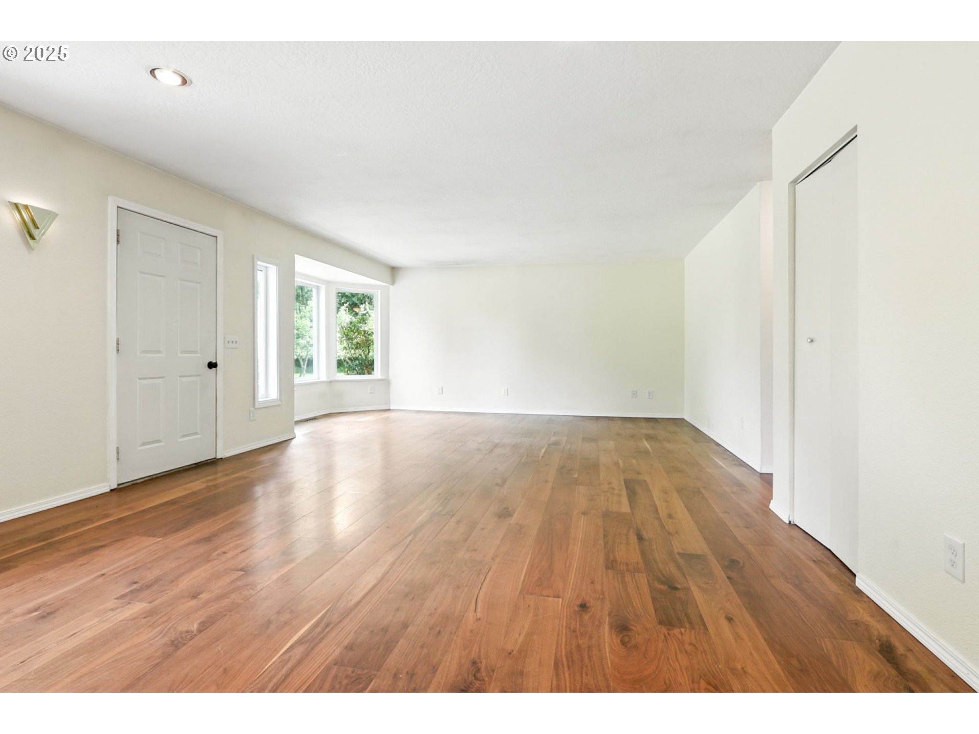 116 Noble Road Winlock, WA 98596 - Photo 3 of 48 a view of wooden floor and windows in a room