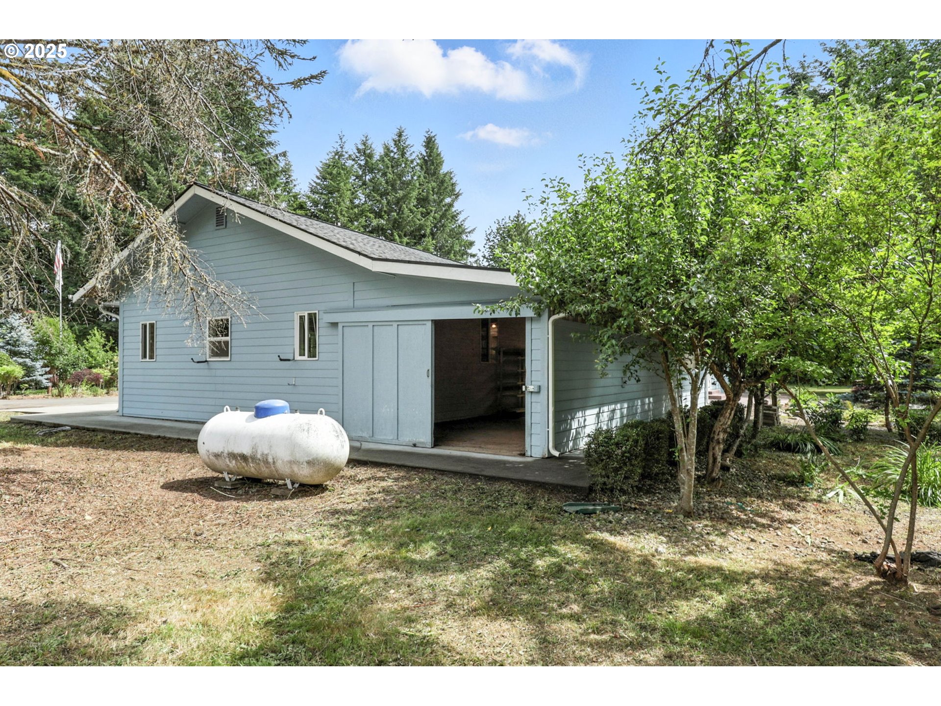 116 Noble Road Winlock, WA 98596 - Photo 33 of 48 a house with trees in the background