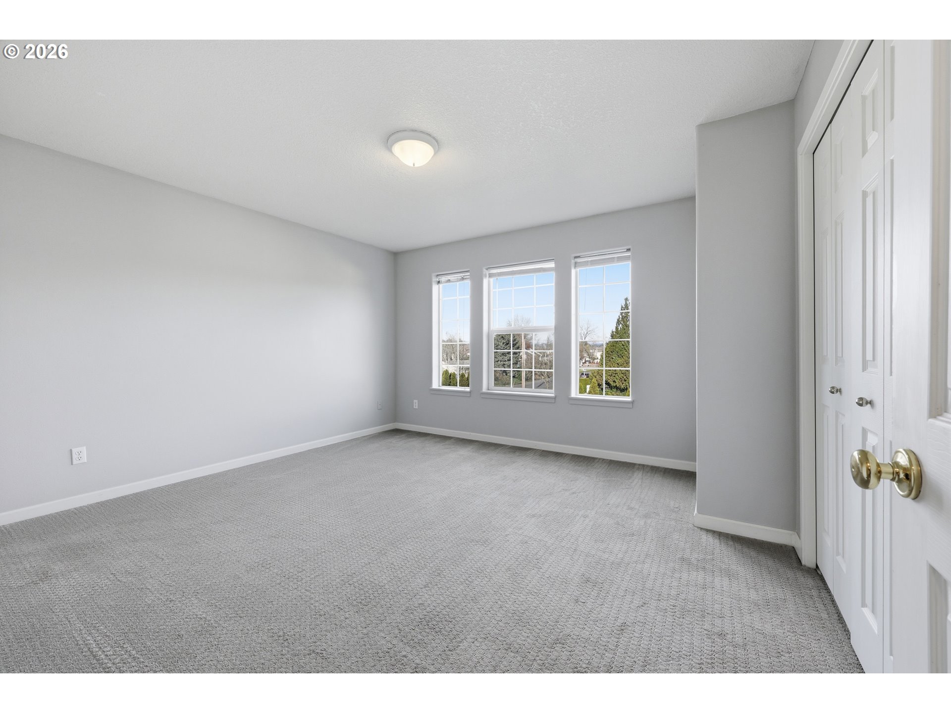 20070 Southwest Cedar Grove Lane Beaverton, OR 97003 - Photo 11 of 19 a view of an empty room with a window