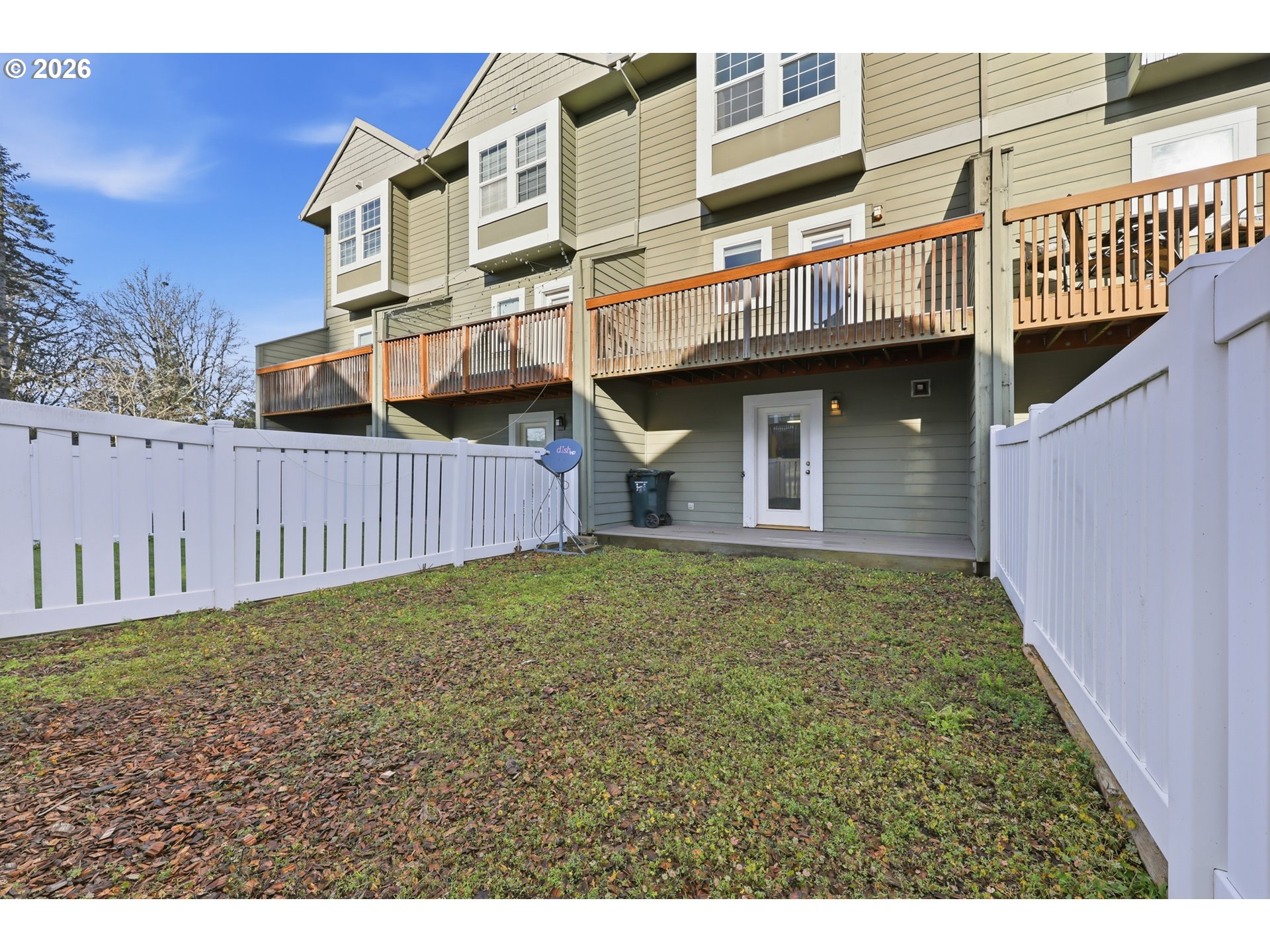 20070 Southwest Cedar Grove Lane Beaverton, OR 97003 - Photo 19 of 19 a view of a house with wooden fence