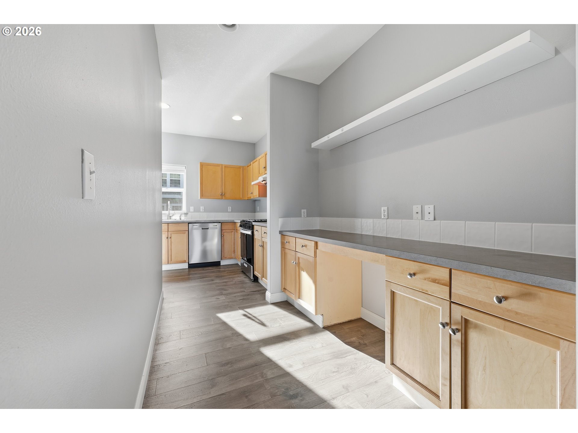 20070 Southwest Cedar Grove Lane Beaverton, OR 97003 - Photo 6 of 19 a view of a kitchen with wooden floor