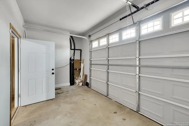 a view of an entryway with a door