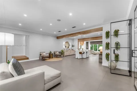 a living room with furniture and a couch