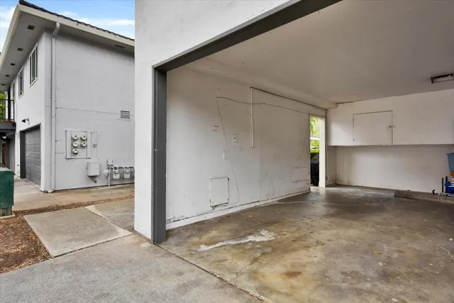 a view of a big room with closet and windows