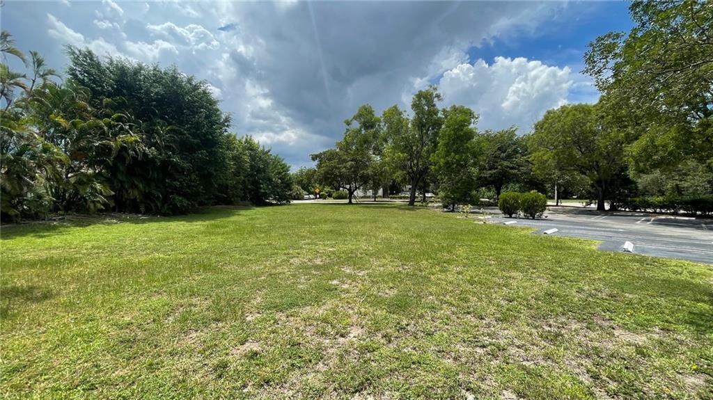 1439 Northwest 94th Way, Unit 1439 Coral Springs, FL 33071 - Photo 14 of 14 a view of green field with tree in the background