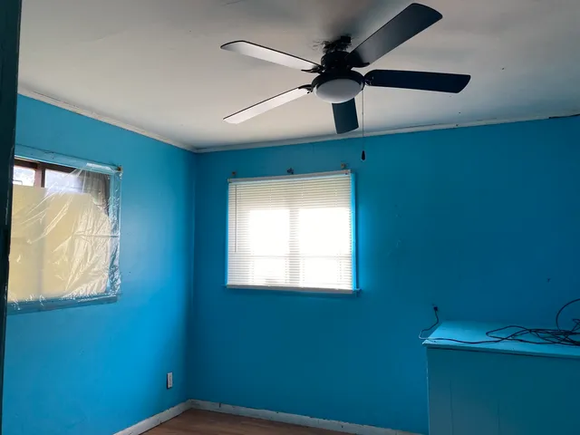 a kitchen with a sink cabinets and appliances