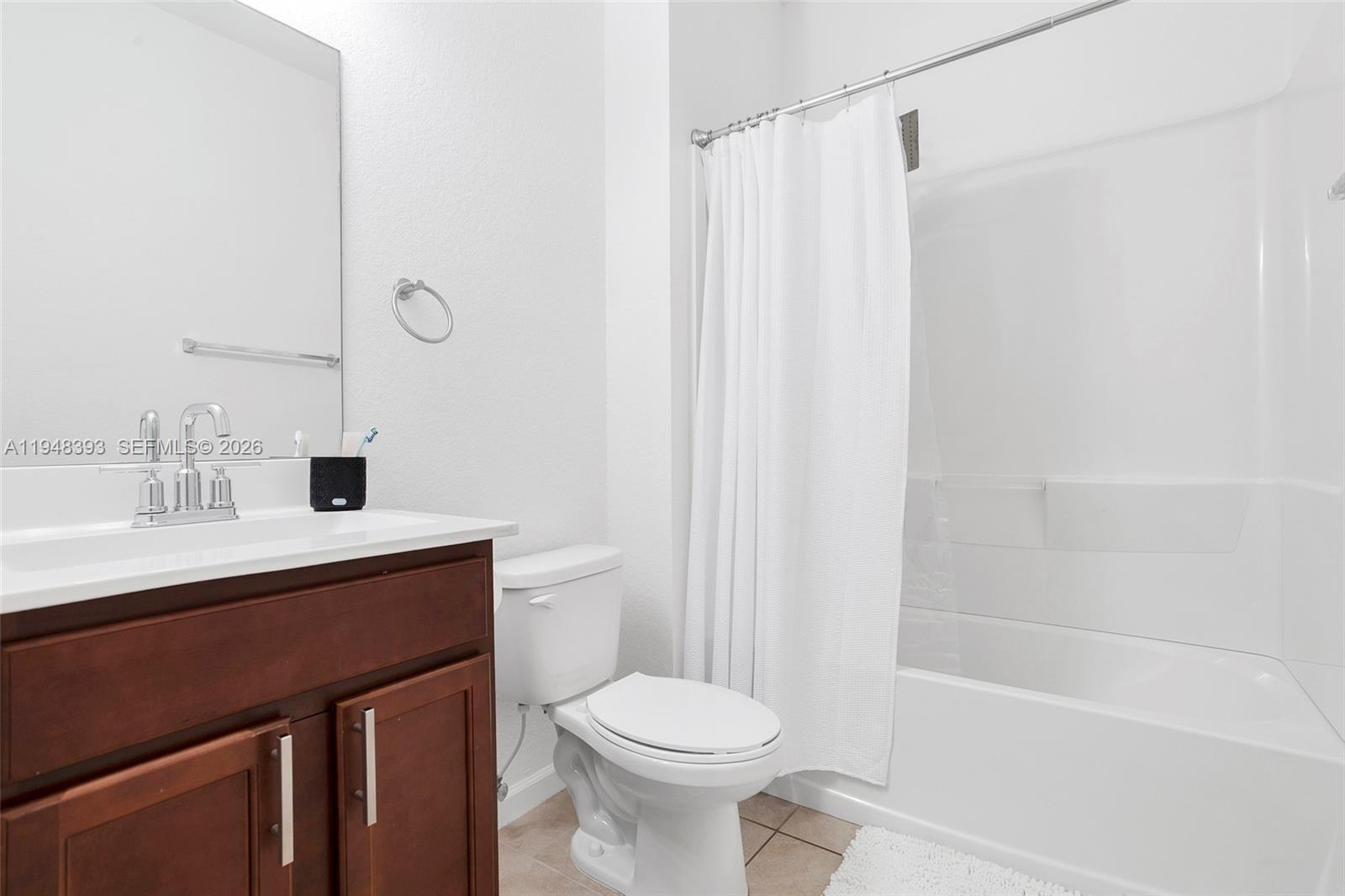 27440 Southwest 135th Ave Road Homestead, FL 33032 - Photo 17 of 75 a bathroom with a sink toilet and shower