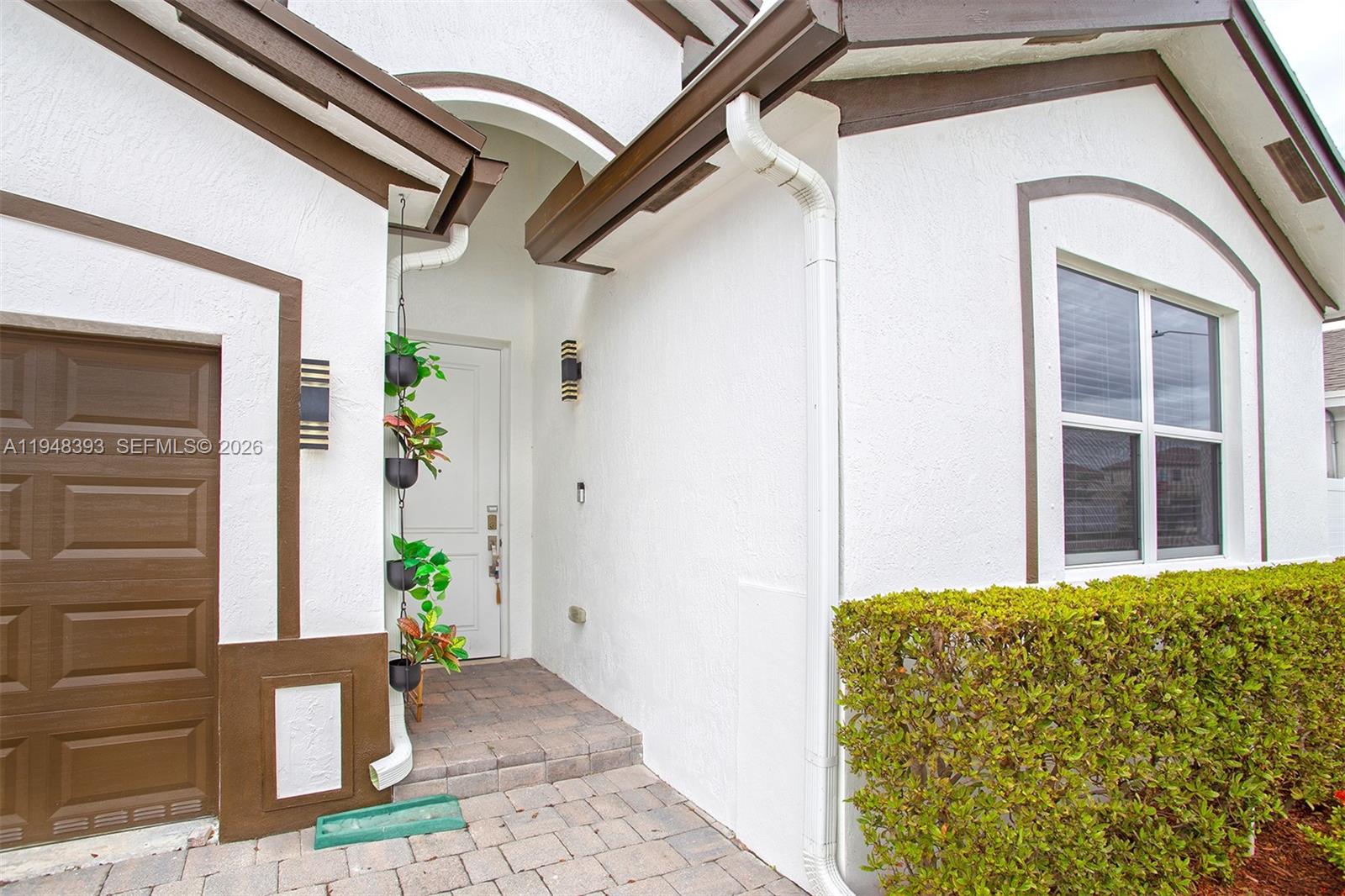 27440 Southwest 135th Ave Road Homestead, FL 33032 - Photo 22 of 75 a front view of a house