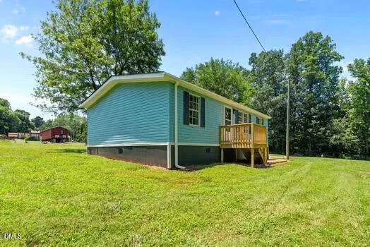 a view of a wooden deck and outdoor space
